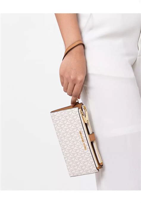 michael kors vanila large wristlet|Michael Kors wristlet.